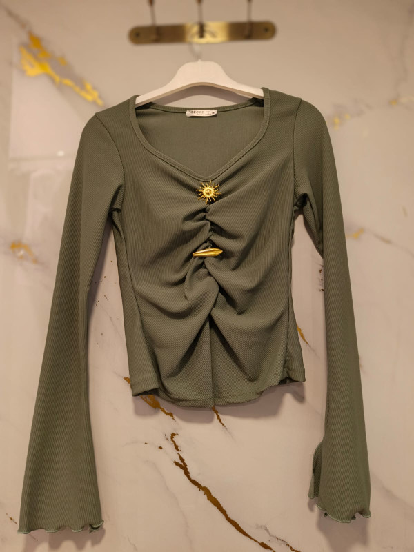 Metal detail cut-out knit top